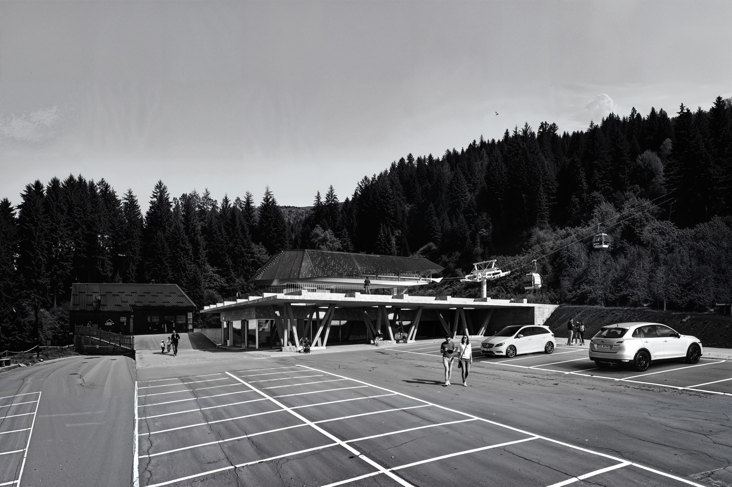 render fotorealistico e fotoinserimento di stazione di montagna con impianto funivia e edificio contemporaneo in contesto alpino borno brescia italia architetto jimmi pianezzola